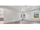 Bright bedroom with hardwood floors, recessed lighting, and ample natural light at 207 Chippewa Ave, Tampa, FL 33606