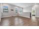 Spacious upstairs bonus room with hardwood floors and natural light at 207 Chippewa Ave, Tampa, FL 33606