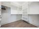 Walk-in closet with custom shelving offering plenty of storage options at 207 Chippewa Ave, Tampa, FL 33606