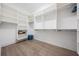 Walk-in closet with custom shelving and ample storage space for clothing at 207 Chippewa Ave, Tampa, FL 33606