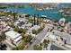 Aerial view of homes conveniently situated near bay access and providing an idyllic setting for a relaxing coastal lifestyle at 2700 Pass A Grille Way, St Pete Beach, FL 33706