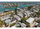 Amazing aerial view of homes nestled near the water, presenting an unparalleled opportunity for those seeking coastal living at 2700 Pass A Grille Way, St Pete Beach, FL 33706