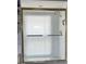 Shower stall enclosed with glass doors and white shower curtain in a bathroom at 2810 Norwood Ln, Venice, FL 34292