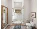 Bathroom with a glass-enclosed shower, sleek fixtures, and neutral tones at 3484 Shore Dr, Safety Harbor, FL 34695
