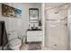 Bathroom featuring a glass-enclosed shower and a modern vanity with stylish bowl sink at 3484 Shore Dr, Safety Harbor, FL 34695