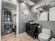 Well-designed bathroom and laundry area featuring stacked washer/dryer and modern vanity at 3484 Shore Dr, Safety Harbor, FL 34695