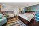 Comfortable bedroom with hardwood floors, bunk beds, and a king bed at 3484 Shore Dr, Safety Harbor, FL 34695