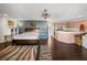 A spacious living room with a bedroom adjacent to a fully-equipped kitchen area at 3484 Shore Dr, Safety Harbor, FL 34695