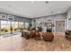Spacious living room featuring comfortable seating, wood floors, and ample natural light at 3484 Shore Dr, Safety Harbor, FL 34695