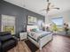 Serene main bedroom with waterfront views, neutral tones, and comfortable furnishings at 3484 Shore Dr, Safety Harbor, FL 34695