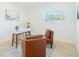 Stylish office space with modern desk, comfortable chairs, and natural light, perfect for productivity at 352 79Th Ne Ave, St Petersburg, FL 33702