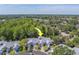 Aerial view of the community highlighting its location, surrounding landscape and road access at 39650 Us Highway 19 N # 743, Tarpon Springs, FL 34689