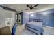 Bedroom featuring luxury vinyl flooring, ceiling fan, natural light, and a convenient workspace at 39650 Us Highway 19 N # 743, Tarpon Springs, FL 34689