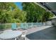 Inviting deck area featuring lounge chairs, perfect for relaxation and outdoor enjoyment at 39650 Us Highway 19 N # 743, Tarpon Springs, FL 34689