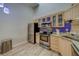 Updated kitchen featuring stainless steel appliances and ample cabinet space at 39650 Us Highway 19 N # 743, Tarpon Springs, FL 34689