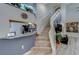 Bright open-concept living space with modern floors, staircase, and ample natural light at 39650 Us Highway 19 N # 743, Tarpon Springs, FL 34689