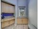 Cozy office nook with custom built-ins, drawers, and a window offering ample natural light at 39650 Us Highway 19 N # 743, Tarpon Springs, FL 34689