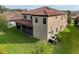 Two-story home showcasing an exterior elevation with well-kept lawn at 4024 Woods Rider Loop, Odessa, FL 33556