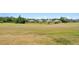 Scenic view of multiple homes with lush green backyards bordering a golf course in a peaceful community at 5113 Epping Ln, Zephyrhills, FL 33541
