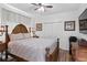Bedroom with a wood bed frame, laminate flooring, and closet at 5113 Epping Ln, Zephyrhills, FL 33541