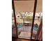 Relaxing balcony with outdoor seating, offering serene views of the community's lush greenery at 5407 Sweetwater Terrace Cir # 5407, Tampa, FL 33634