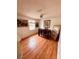Bright dining room with wood floors and natural light is perfect for Gathering dinners at 5407 Sweetwater Terrace Cir # 5407, Tampa, FL 33634