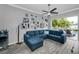 Spacious living area with modern decor and sliding glass doors leading to the pool at 5807 Cay Cove Ct, Tampa, FL 33615