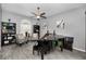 Stylish living room featuring a piano, comfortable seating, and modern decor at 5807 Cay Cove Ct, Tampa, FL 33615