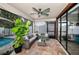 A beautiful outdoor patio with comfortable seating and brick flooring, creating a perfect space for relaxation and entertainment at 5807 Cay Cove Ct, Tampa, FL 33615