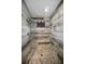 Walk-in shower features stylish tilework and a built-in niche for storage at 5807 Cay Cove Ct, Tampa, FL 33615