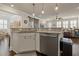 View of the kitchen with stainless steel appliances and granite countertops at 597 Ozona Village Dr, Palm Harbor, FL 34683