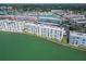 Aerial view of the condo with scenic views of the water and surrounding neighborhood at 5980 Shore S Blvd # 403, Gulfport, FL 33707