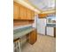 Bright eat-in kitchen with tile floors and lots of storage at 5980 Shore S Blvd # 403, Gulfport, FL 33707