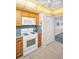 Efficient kitchen layout with ample cabinet space and modern appliances at 5980 Shore S Blvd # 403, Gulfport, FL 33707