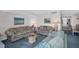 Spacious living room featuring two sofas, accent tables and a coffee table at 5980 Shore S Blvd # 403, Gulfport, FL 33707