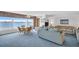 Comfortable living room with a bay window showcasing stunning water views and natural light at 5980 Shore S Blvd # 403, Gulfport, FL 33707