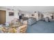 Open living space with dining area and living room with two sofas at 5980 Shore S Blvd # 403, Gulfport, FL 33707