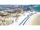 Beautiful aerial view of the beach, cityscape, and waterfront at 600 Bayway Blvd # 304, Clearwater, FL 33767