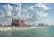 Picturesque beach scene showcasing a grand pink hotel, white sand, and clear ocean waters at 600 Bayway Blvd # 304, Clearwater, FL 33767