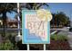 A welcoming sign to Clearwater Beach, adorned with a beach umbrella symbol at 600 Bayway Blvd # 304, Clearwater, FL 33767