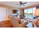Bright living room with a view of the water and access to a balcony, offering seamless indoor-outdoor living at 600 Bayway Blvd # 304, Clearwater, FL 33767