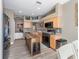 Well-equipped kitchen featuring a central island, stainless steel appliances, and ample cabinet space at 6018 Gannetdale Dr, Lithia, FL 33547