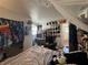 Bedroom featuring a queen-sized bed, an American flag, and a desk area at 6047 67Th N Ave, Pinellas Park, FL 33781