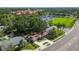 Aerial view of a beautiful property surrounded by lush greenery and a nearby park area at 6207 Gulfport S Blvd, Gulfport, FL 33707