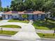 Charming single-story home with a well-manicured lawn, updated windows, and inviting curb appeal at 6207 Gulfport S Blvd, Gulfport, FL 33707