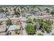 Aerial view of a residential neighborhood and surrounding greenery at 6333 Aberdeen Ave, New Port Richey, FL 34653