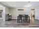 Dining room features new flooring and neutral paint at 6333 Aberdeen Ave, New Port Richey, FL 34653