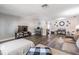 An open-concept living room with modern flooring and ample space for entertaining and relaxing at 6333 Aberdeen Ave, New Port Richey, FL 34653