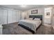 Comfortable main bedroom with attached bathroom and neutral color scheme at 6333 Aberdeen Ave, New Port Richey, FL 34653