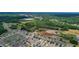High aerial shot of the house, proximity to green spaces, and the surrounding suburban development at 6648 Seaway Dr, Brooksville, FL 34604